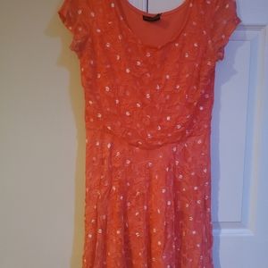 Orange and white poke-a-dot dress